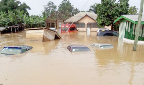 Some vehicles and property submerged by the flood Some vehicles and property submerged by the flood